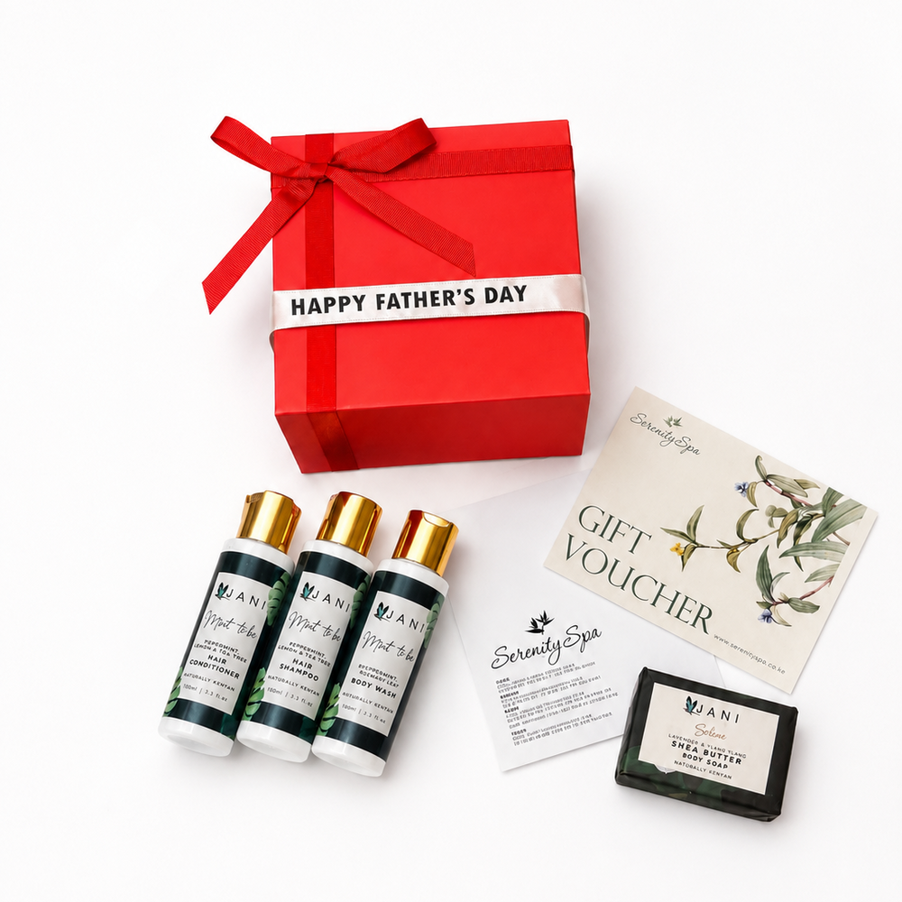 Father's Day gift set with red box, skincare products, and a gift voucher on a white background