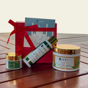 JANI skincare products on a wooden surface with a branded box in the background