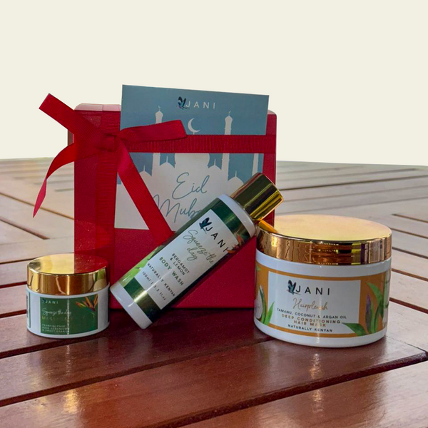 JANI skincare products on a wooden surface with a branded box in the background